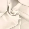 A close-up, draped view of a cream-colored fabric. Produktbild-Vorschau