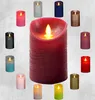 A collage of various LED real wax candles in different colors and sizes, with a large red candle in the center. Podgląd zdjęcia produktu