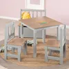 A children's table and chair set with a stuffed lion toy on a rug. Produktbild-Vorschau
