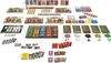 A collection of board game components laid out on a white background. Produktbild-Vorschau