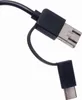 A close-up shot of a black USB cable with two different connector types. Náhled obrázku produktu