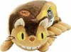 A plush toy of the Catbus from My Neighbor Totoro, with a smaller Totoro character peeking out from inside. Voir les images du produit