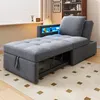 A gray sofa bed is shown in a room with a window and a bookshelf in the background. The sofa has a built-in shelf with blue LED lighting. Voir les images du produit