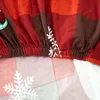 A close-up view of a red and brown checkered fabric with white snowflake patterns, likely a Christmas-themed chair cover. Náhled obrázku produktu