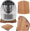 A collage of a kitchen appliance and wooden accessories for it. Produktbild-Vorschau