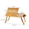 A wooden laptop table with dimensions indicated by measurement lines and text. Produktbild-Vorschau