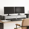 A desk setup with a monitor stand, two monitors, a keyboard, and a chair. Náhľad obrázku produktu