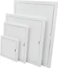 Four white inspection doors of different sizes are arranged diagonally. Náhled obrázku produktu