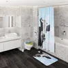 A modern bathroom with marble tiles, a vanity, toilet, shower curtain, and bath mat, all featuring cow-themed designs. Produktbild-Vorschau