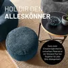 A cozy living room scene with a pouf and a side table. Produktbild-Vorschau