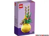 A LEGO set box featuring a floral arrangement in a yellow vase. Podgląd zdjęcia produktu