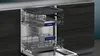 The inside of a dishwasher with two racks extended. Produktbild-Vorschau