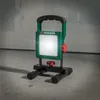 A PARKSIDE® Akku–LED-Strahler »PAS 2200 C3« is shown on a concrete floor in front of a textured wall. Produktbild-Vorschau
