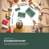 Two children are playing on the floor with art supplies and toys, with storage baskets in the foreground. Produktbild-Vorschau