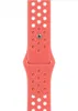 A close-up view of a coral-colored Apple Nike Sport Band for an Apple Watch. Anteprima dell’immagine prodotto