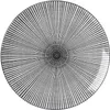 A top-down view of a round plate with a black and white radial pattern. Anteprima dell’immagine prodotto