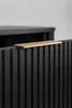A close-up shot of a black cabinet with a gold handle. Anteprima dell’immagine prodotto