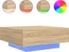 A coffee table with LED lights and color swatches.