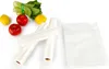 A collection of food items and rolls of plastic wrap on a white background. Produktbild-Vorschau