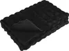 A folded black faux fur blanket is shown against a white background. Podgląd zdjęcia produktu