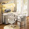 A modern L-shaped desk setup with a computer, monitor, and chair in a well-lit room. Anteprima dell’immagine prodotto