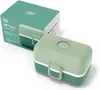 A green and white Monbento lunchbox is shown next to its packaging. Produktbild-Vorschau
