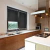 A modern kitchen with wooden cabinets, a stainless steel range hood, and a double sink. Produktbild-Vorschau