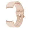 A close-up studio shot of a light pink silicone watch strap with rose gold buckle. Produktbild-Vorschau