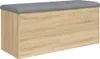A storage bench with a gray upholstered top and a wood-grain finish on the front and sides, shown against a white background. Náhľad obrázku produktu
