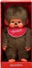 A Monchhichi doll is presented in its red packaging. Produktbild-Vorschau