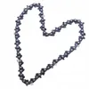A chainsaw chain is laid out in a heart shape on a white background. Náhľad obrázku produktu