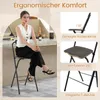 A woman is sitting on a bar stool in a modern kitchen or bar area, with product feature callouts on the right side of the image. Produktbild-Vorschau