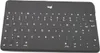 A black Logitech keyboard is shown from a top-down perspective on a white background. Podgląd zdjęcia produktu