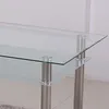 Close-up of a glass table with metal legs. Náhľad obrázku produktu