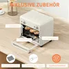 A cream-colored mini oven is shown on a wooden countertop, with various accessories displayed around it and labeled with text. Produktbild-Vorschau