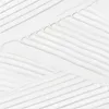 A close-up abstract view of a white textured surface with parallel ridges. Produktbild-Vorschau