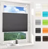 A dark gray pleated blind is shown covering the lower part of a window, with a view of a forest and sky visible through the upper part of the window. To the right, a grid of color swatches for the blinds is displayed. Produktbild-Vorschau