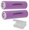 Two purple cylindrical batteries and a clear plastic battery case. Produktbild-Vorschau