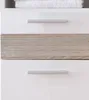 A close-up view of a white cabinet with a wood-grain drawer front and silver handles. Anteprima dell’immagine prodotto