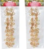 Two packages of straw chains with sun motifs, likely for Christmas decoration. Produktbild-Vorschau