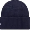 A close-up studio shot of a navy blue beanie. Podgląd zdjęcia produktu
