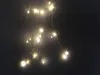 A string of LED lights against a dark background. Náhľad obrázku produktu