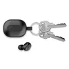 A black earbud case with a keychain and two keys, and a single black earbud. Anteprima dell’immagine prodotto