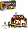 A LEGO Creator gingerbread market stall set with figures and a snowman, shown with its packaging. Anteprima dell’immagine prodotto