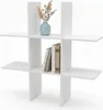 A white shelf unit with decorative items. Produktbild-Vorschau