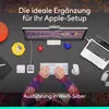 A desk setup with a monitor, laptop, keyboard, mouse, and headphones, with hands typing on the keyboard. Produktbild-Vorschau