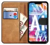 A book-style phone case with cards and cash inserted, and a smartphone displaying a colorful wallpaper. Anteprima dell’immagine prodotto