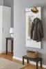 An entryway with a coat rack, a bench, a basket, a table with a lamp, and a tall cabinet. Produktbild-Vorschau
