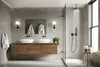 A modern bathroom with a double vanity and a walk-in shower. Náhľad obrázku produktu