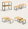 Four different configurations of a two-tier wooden shelf unit with black metal frames, presented on a white background. Produktbild-Vorschau